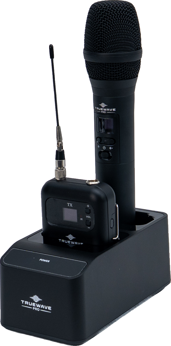 AIR-BX-B1 bodypack charging in the AIR-BX Charging Dock next to a handheld microphone